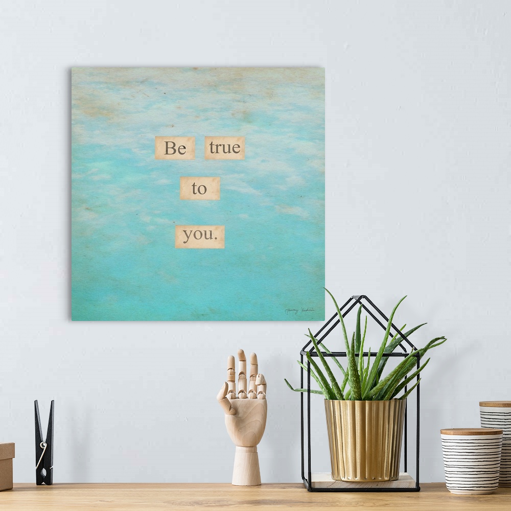 A bohemian room featuring "Be True To You." in small squares overlapping in faded blue to white sky background.