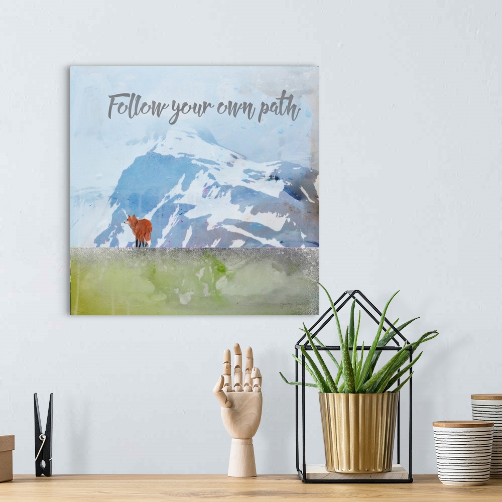 A bohemian room featuring "Follow Your Own Path" in gray with a red fox standing before blue mountains and sky with a weath...