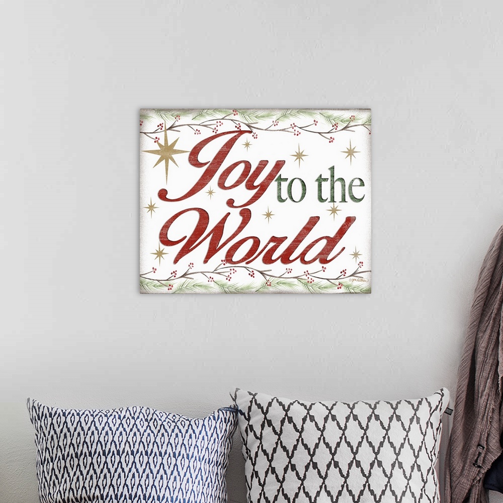 A bohemian room featuring "Joy To The World" in red and green bordered by holly branches and surrounded by gold stars with ...