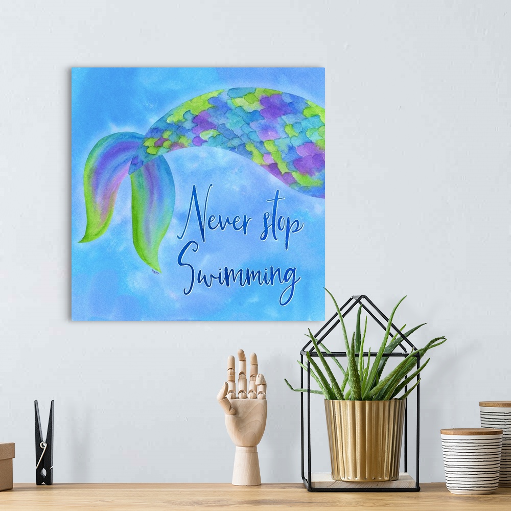 A bohemian room featuring "Never Stop Swimming" with a multi-colored mermaid tail on a blue background.