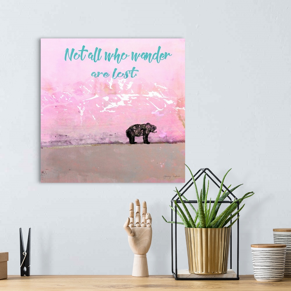 A bohemian room featuring "Not All Who Wander Are Lost" in teal with a black bear standing before pink mountains and sky an...