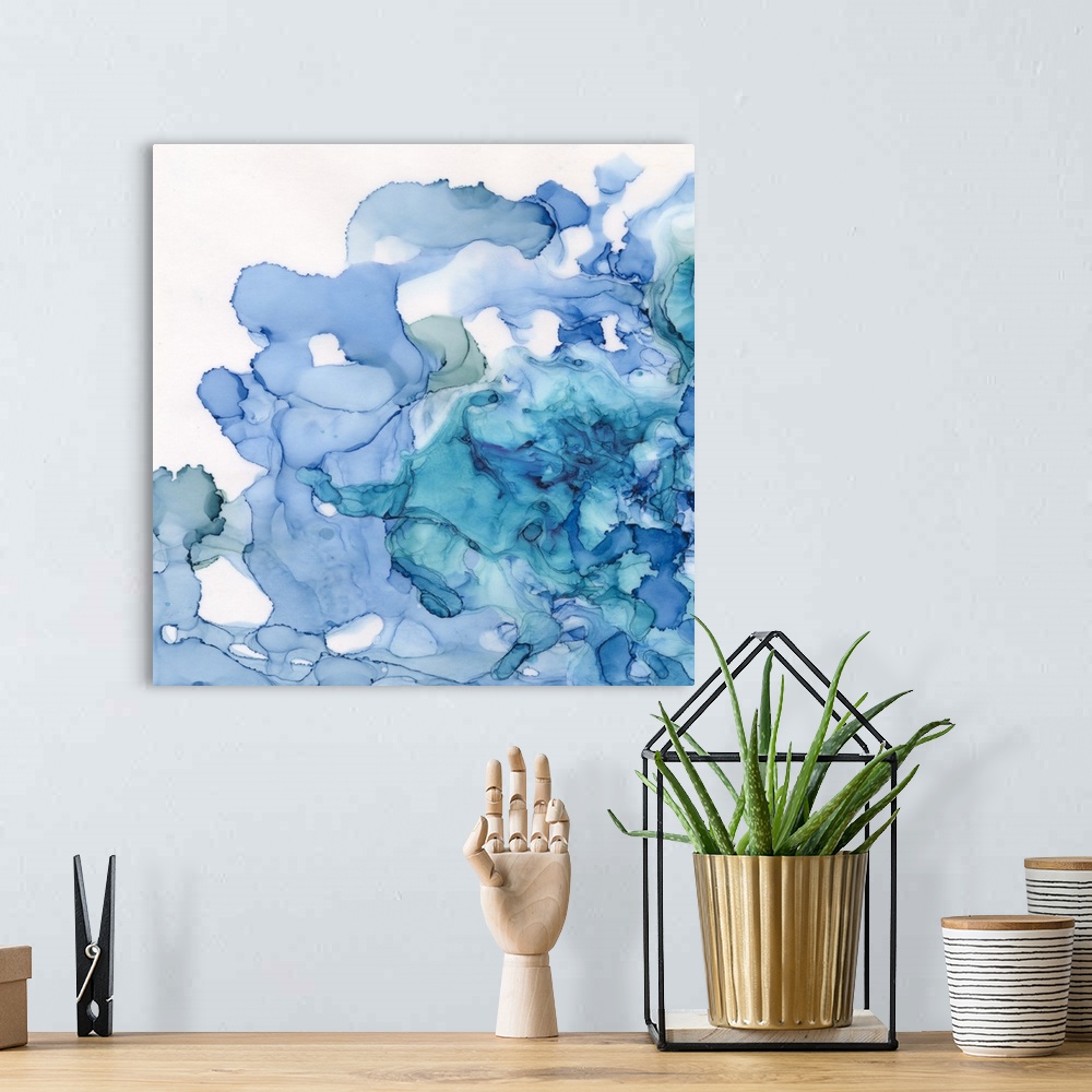 A bohemian room featuring Abstract watercolor painting of swirls in shades of blue.
