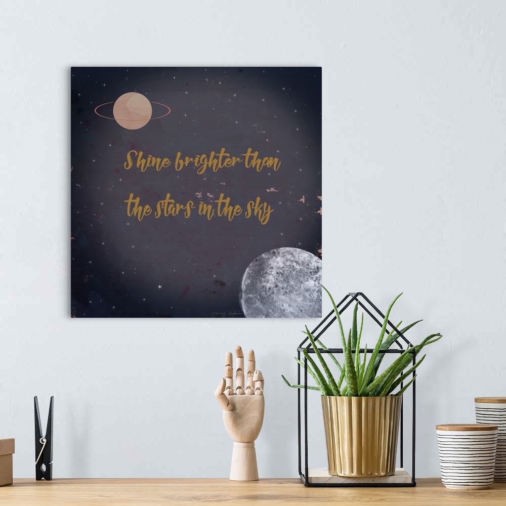 A bohemian room featuring "Shine Brighter Than The Stars In The Sky" in gold against an image of space.
