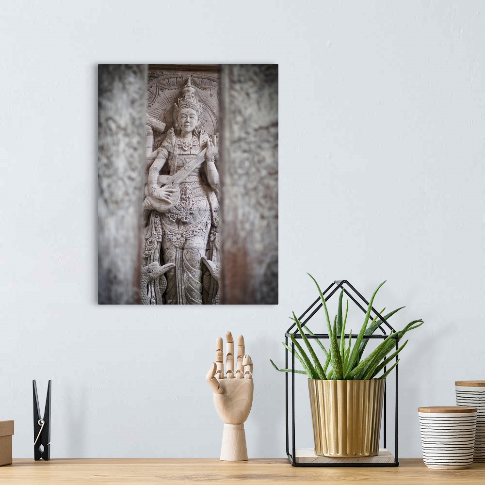 A bohemian room featuring Temple carving, Ubud, Bali, Indonesia, Southeast Asia, Asia