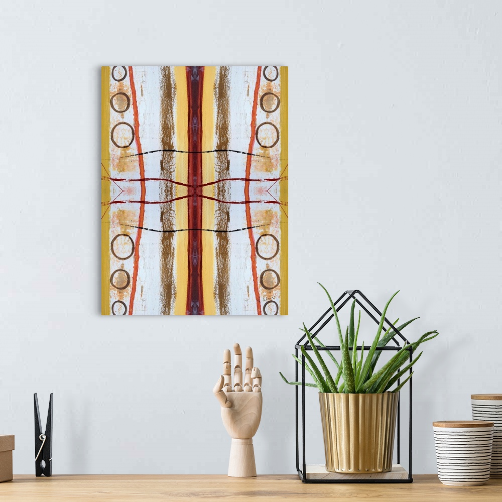 A bohemian room featuring Abstract contemporary painting resembling a kaleidoscopic image, in yellow, orange, and white tones.