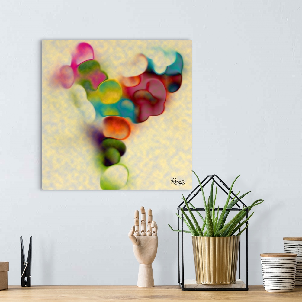 A bohemian room featuring Square abstract art with dream-like puffs of color.