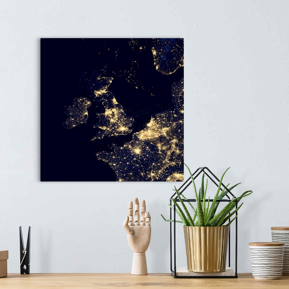 A bohemian room featuring North Sea at night. Black marble satellite image of the North Sea at night. Lights from ships and...