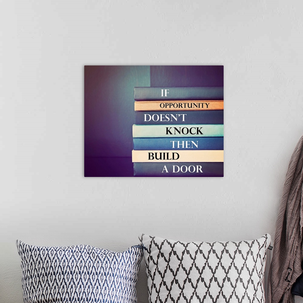 A bohemian room featuring an inspirational quote by unknown source on blue background with a stack of books