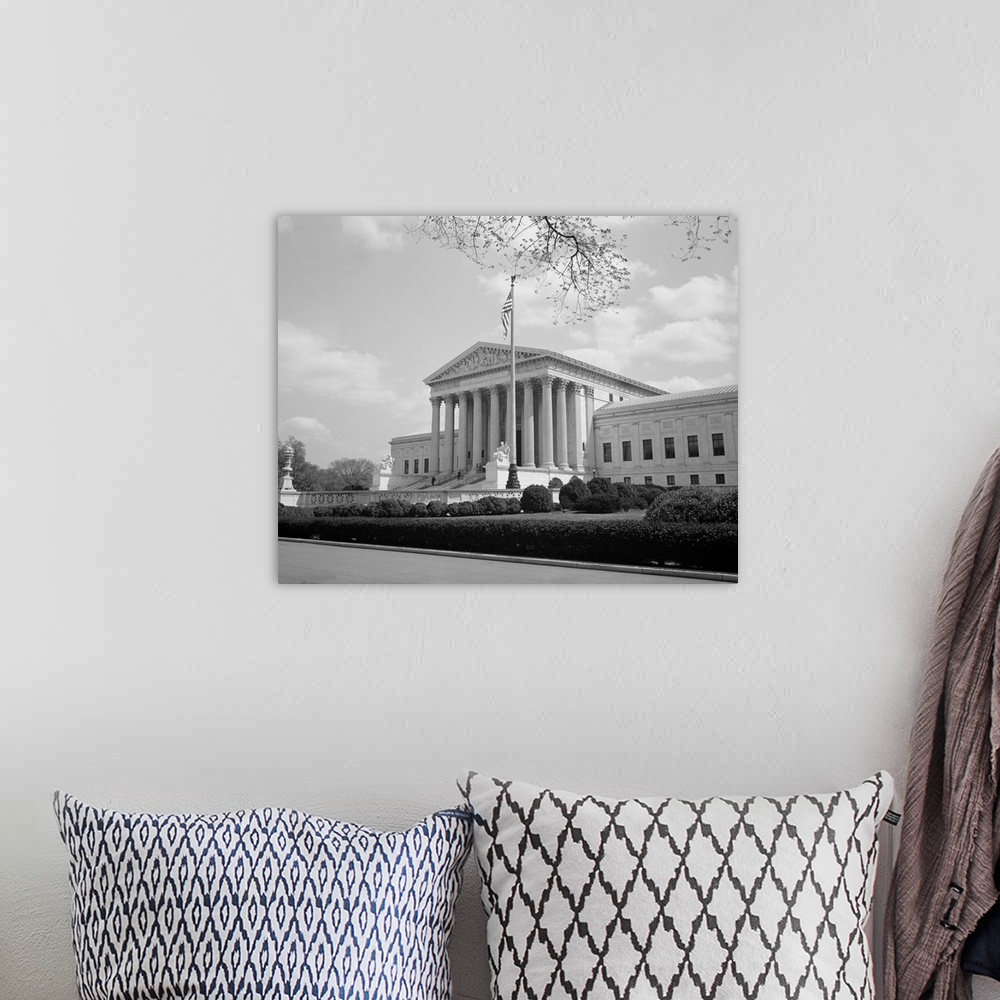 A bohemian room featuring American history photo showing the facade of the United States Supreme Court.