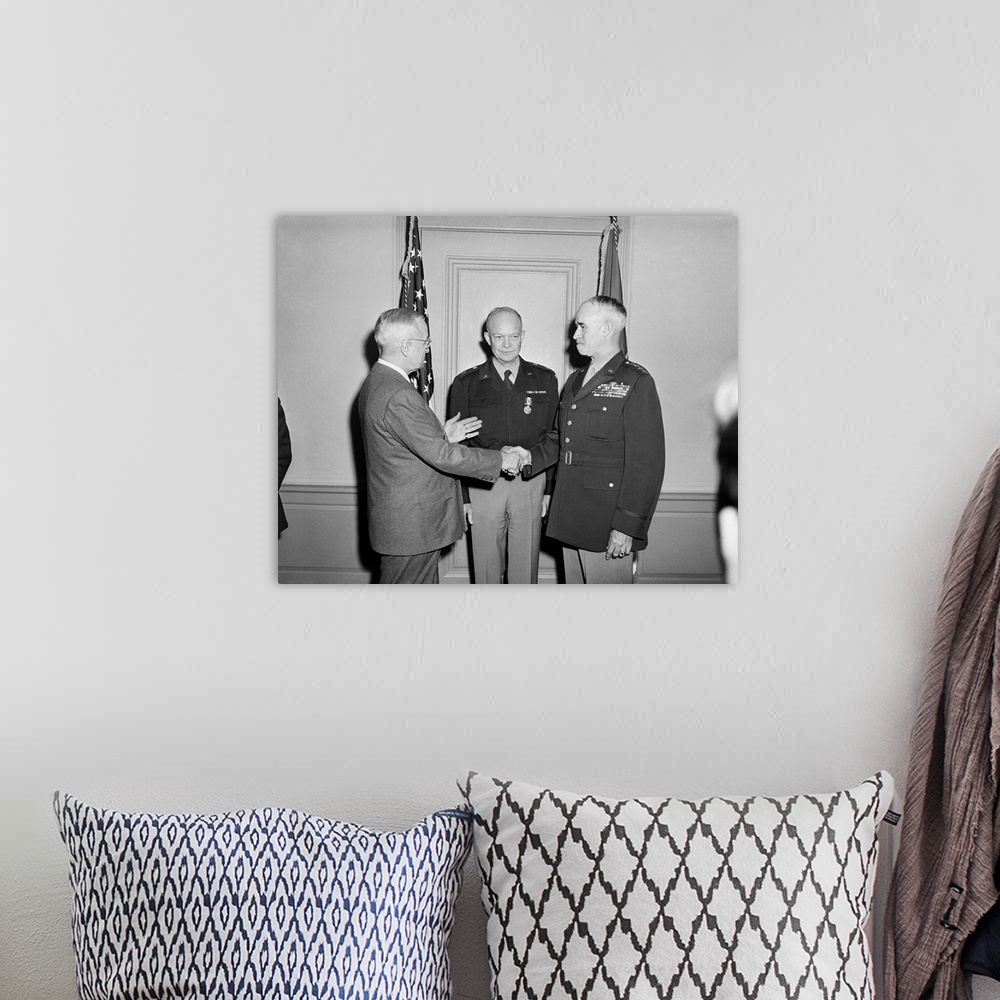 A bohemian room featuring President Harry Truman shaking hands with General Omar Bradley.
