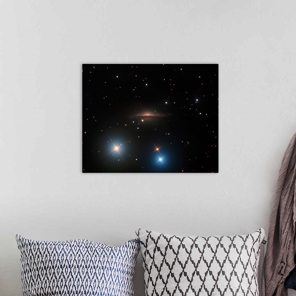 A bohemian room featuring Spiral galaxy NGC 1055.