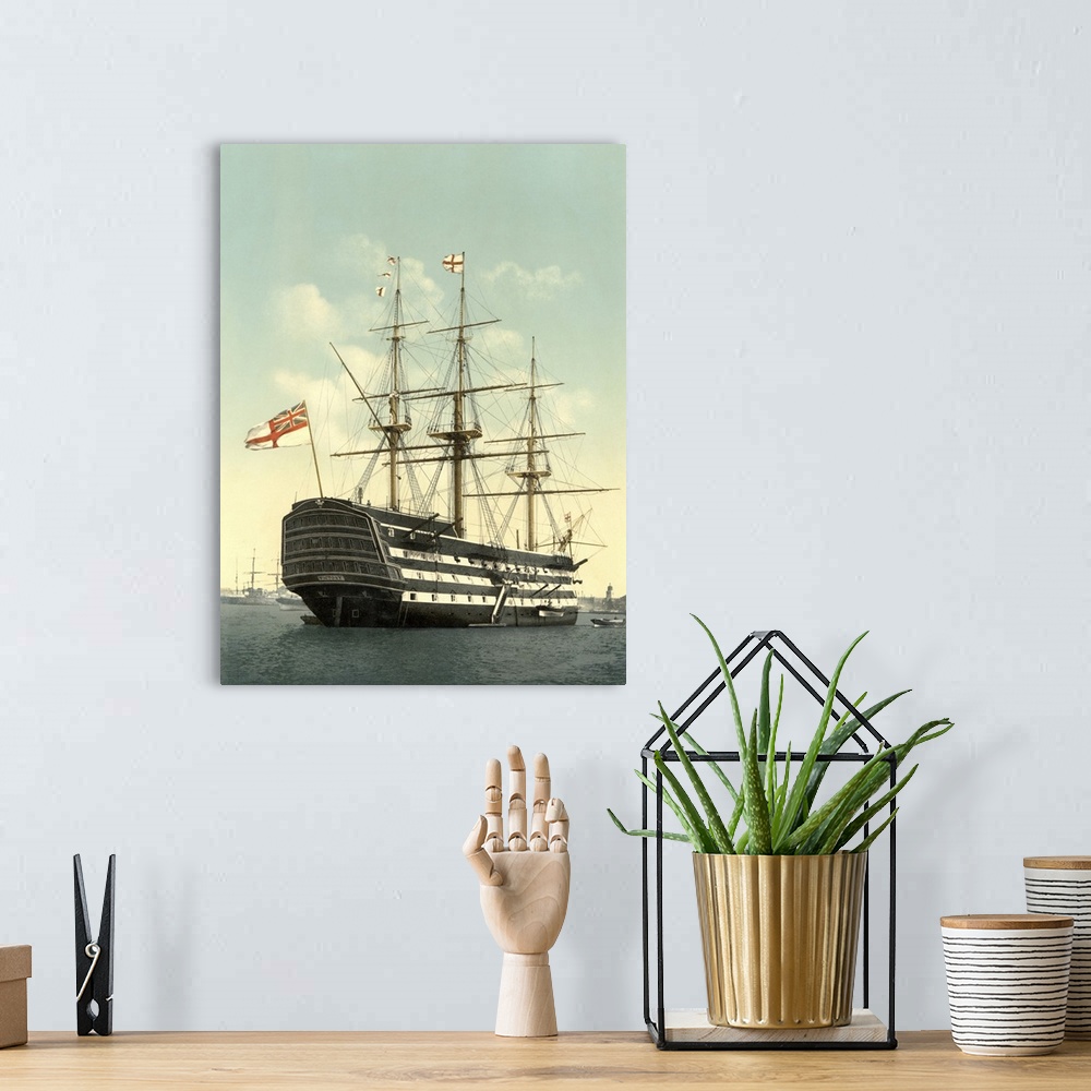 A bohemian room featuring Vintage maritime history print of the HMS Victory.