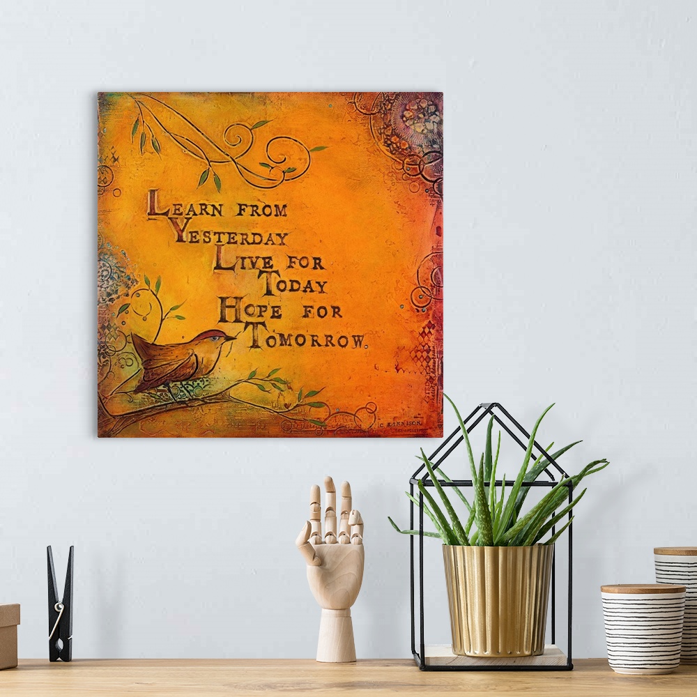 A bohemian room featuring "Learn From Yesterday Live For Today Hope For Tomorrow"