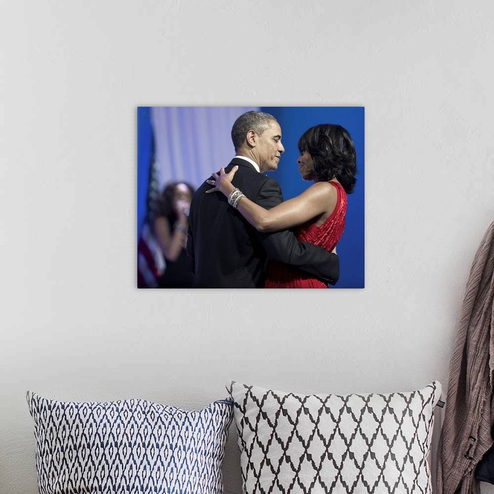 A bohemian room featuring BARACK OBAMA (1961- ). 44th President of the United States. Dancing with First Lady Michelle Obam...
