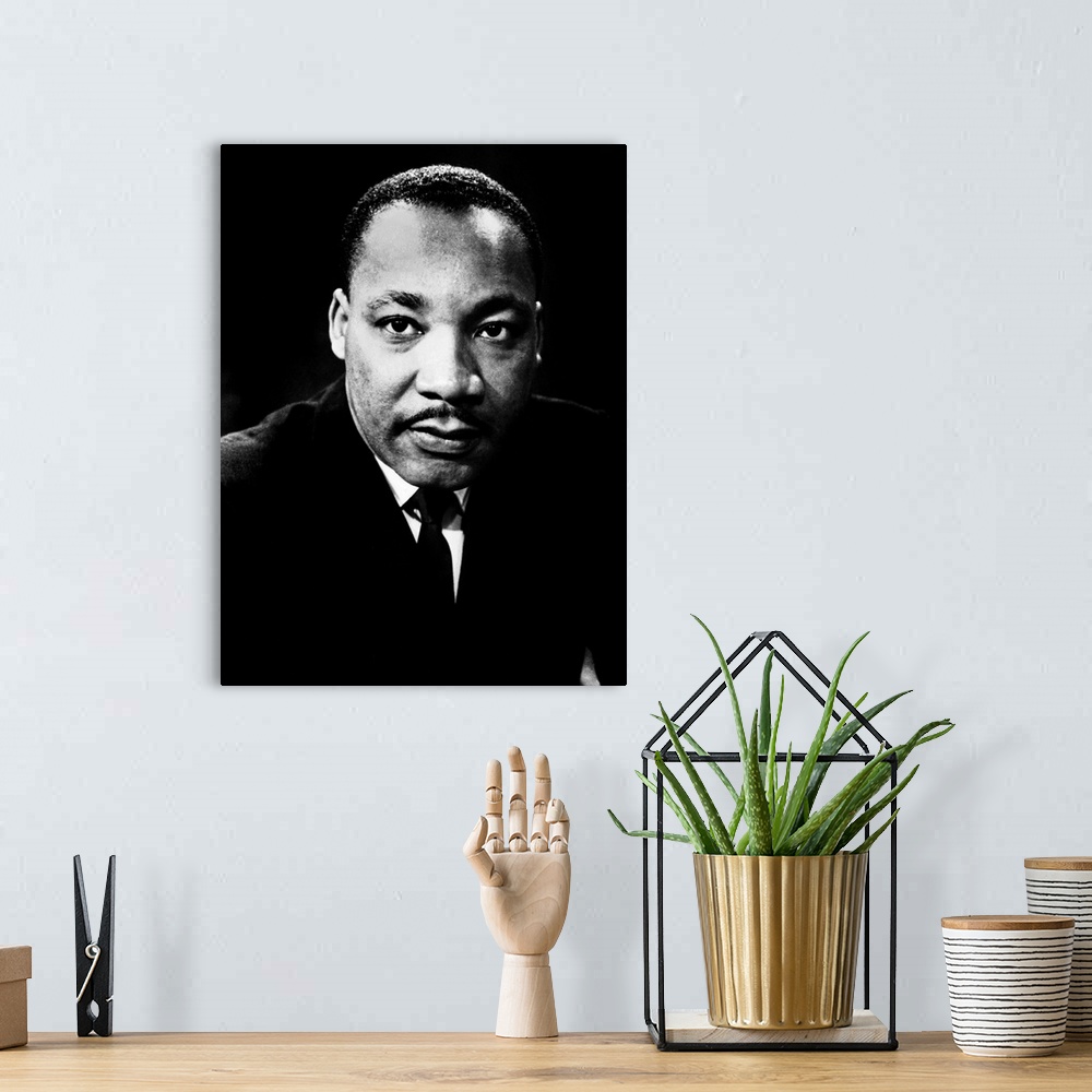 A bohemian room featuring MARTIN LUTHER KING, Jr. (1929-1968). American cleric and civil rights leader. Photograph, c1968.