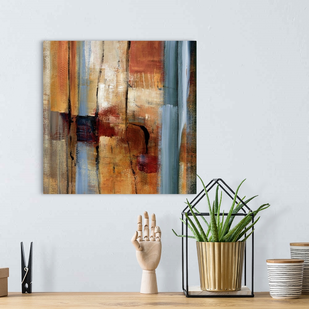 A bohemian room featuring This wall art is an abstract square painting of slates of brush strokes and paint textures.