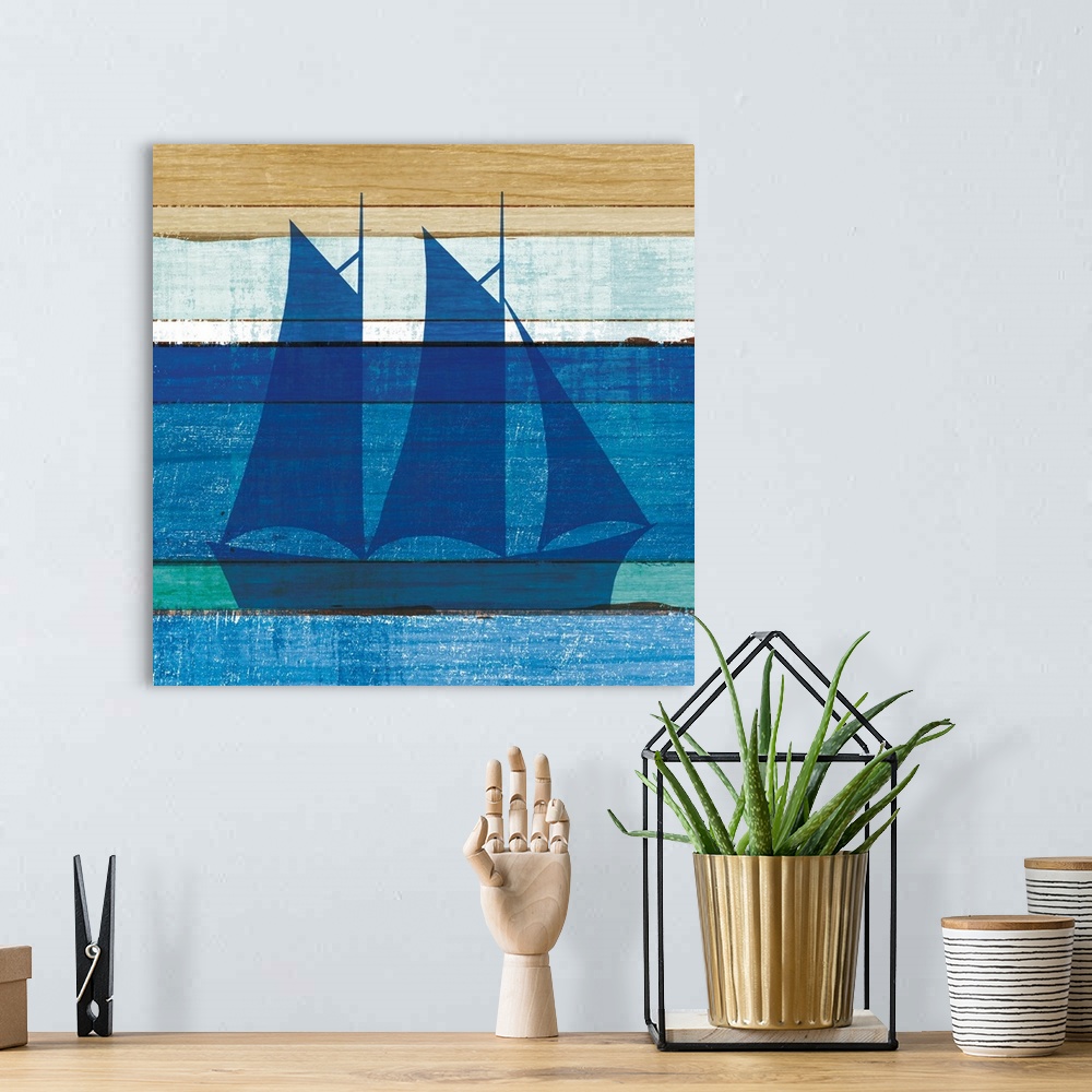 A bohemian room featuring Blue sailboat on a blue and brown painted wood background.
