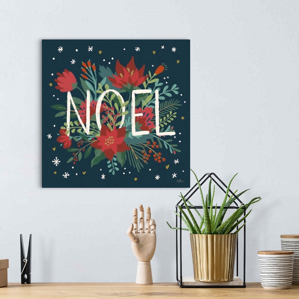 A bohemian room featuring Decorative artwork of red flowers and leaves with the text "Noel" on a dark navy background.