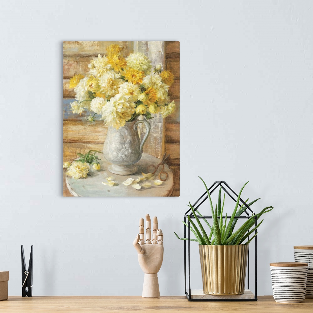 A bohemian room featuring Contemporary painting of yellow flowers in jug used as a vase sitting on a table.