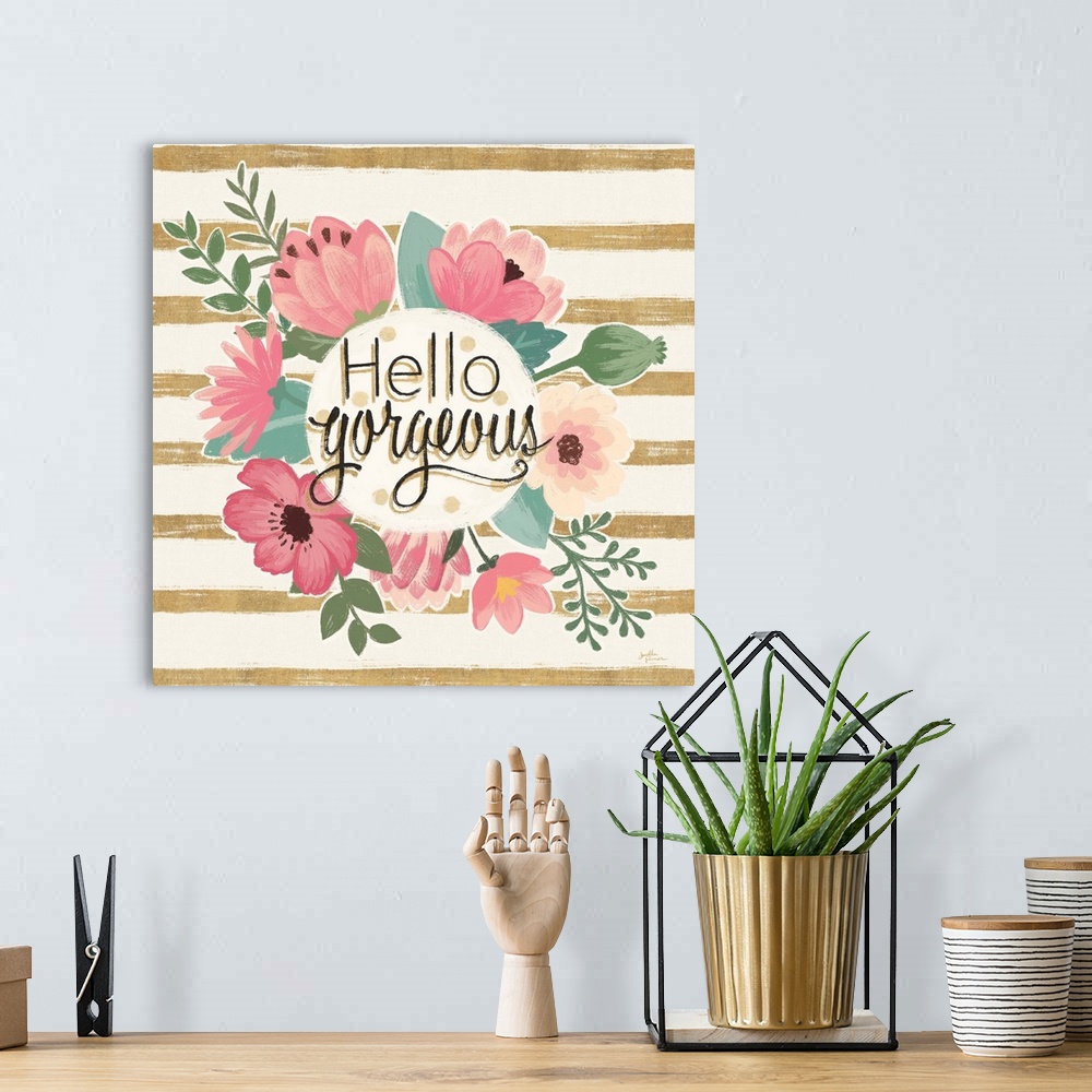 A bohemian room featuring "Hello Gorgeous" surrounded by pink flowers on a gold and cream striped background.