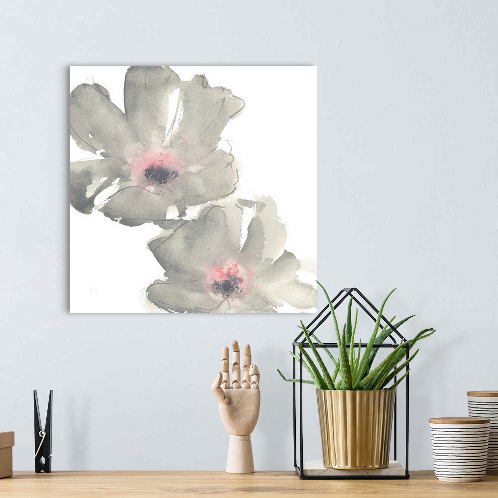 A bohemian room featuring Decorative artwork of delicate flowers filled with pink and gray watercolor.