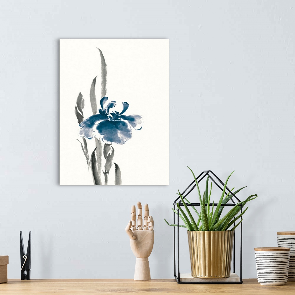A bohemian room featuring Vertical watercolor painting of a blue iris flower against a white background.