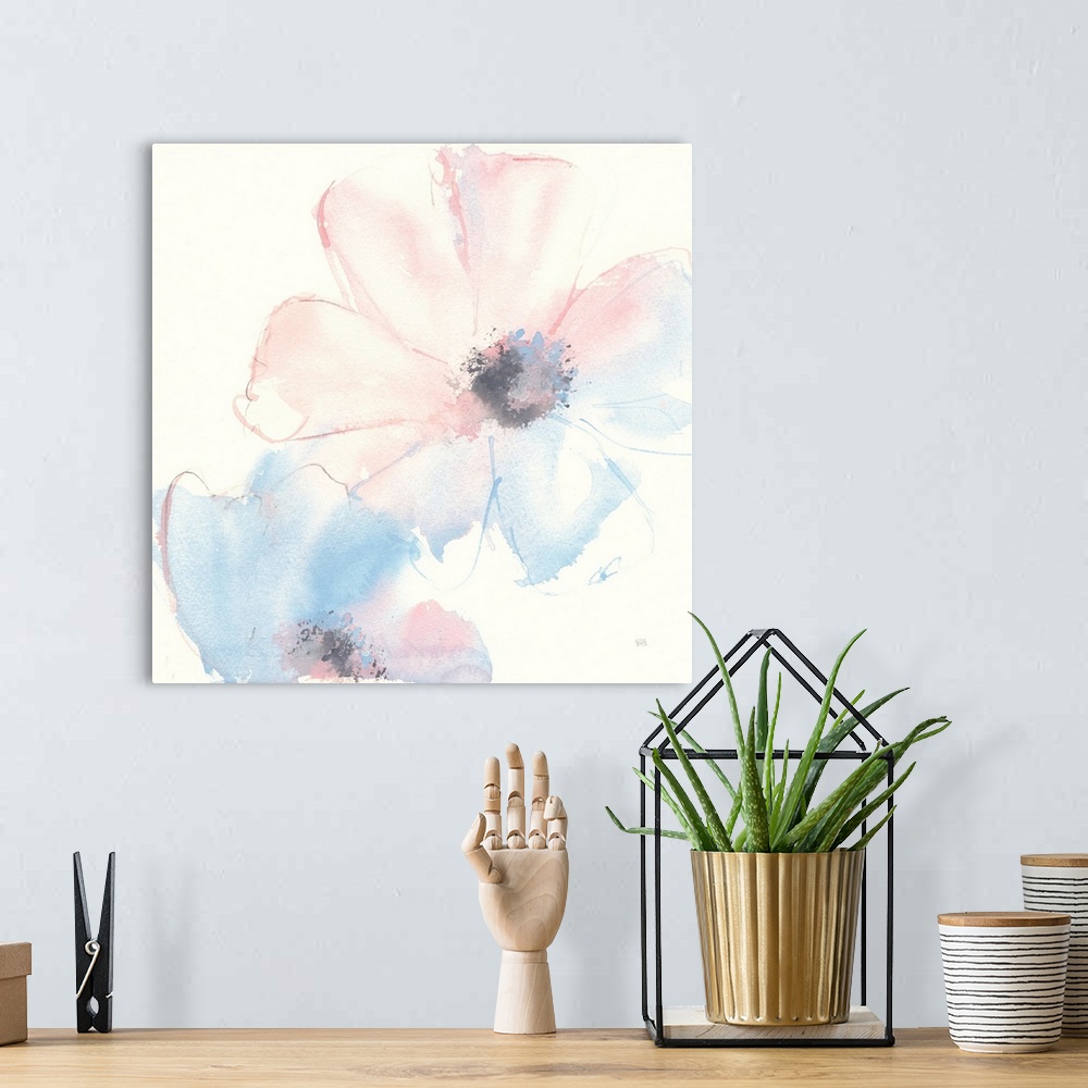 A bohemian room featuring Decorative artwork of delicate flowers filled with a watercolor gradient of pink and blue.