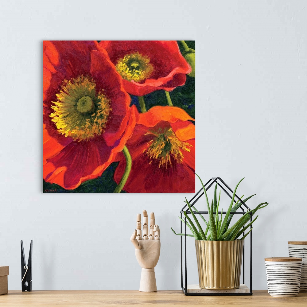 A bohemian room featuring Painting of three poppy flowers up close in the sun.