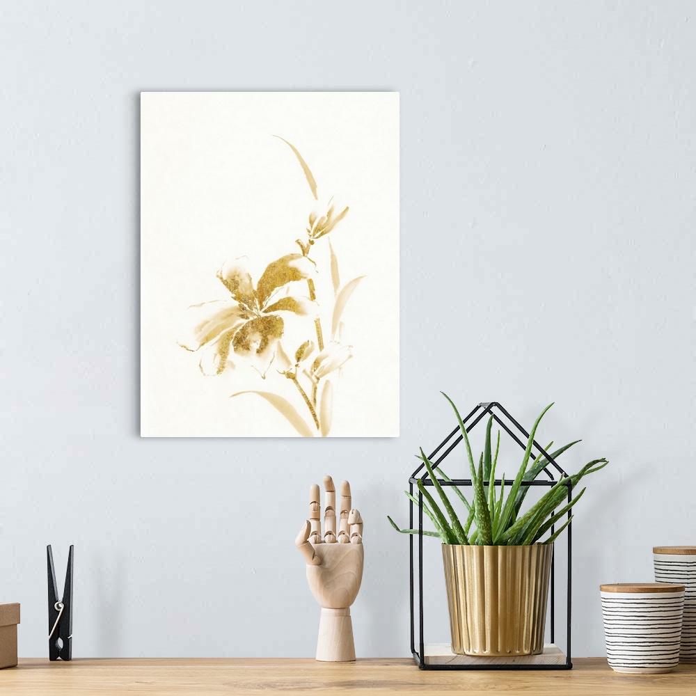 A bohemian room featuring Vertical watercolor painting of a day lily in metallic gold against a white background.