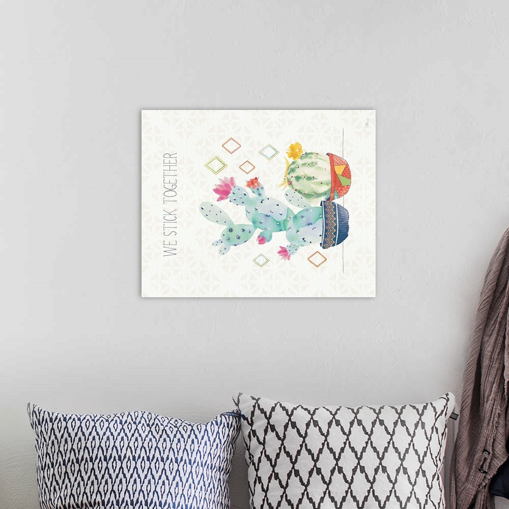 A bohemian room featuring Vertical decorative artwork of colorful cactus on a neutral background with the text "We Stick To...