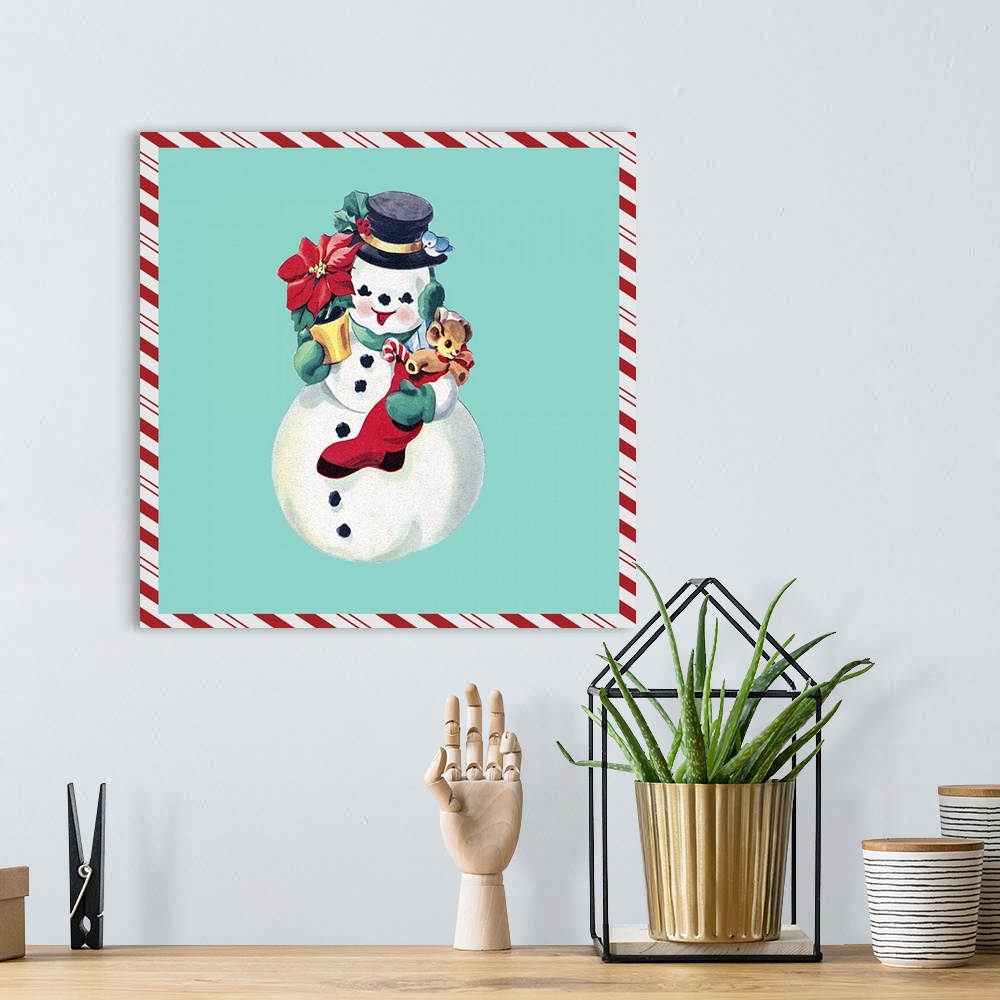 A bohemian room featuring Square vintage artwork of a snowman holding a stocking and poinsettia on a teal background border...