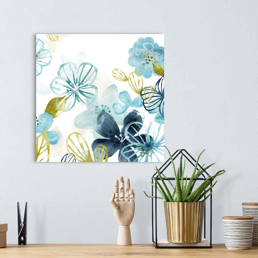 A bohemian room featuring Watercolor painting of delicate blue and gold flowers.