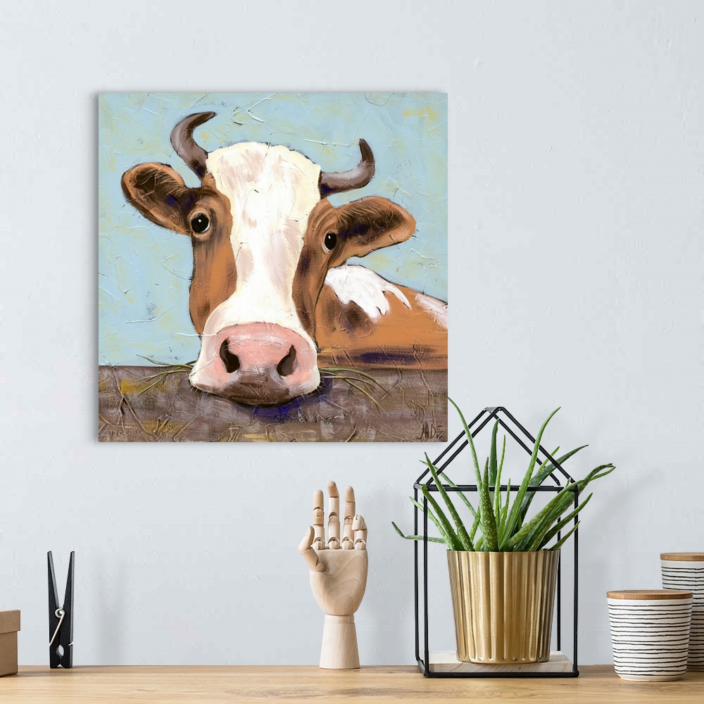 A bohemian room featuring Contemporary painting of a portrait of a cow.