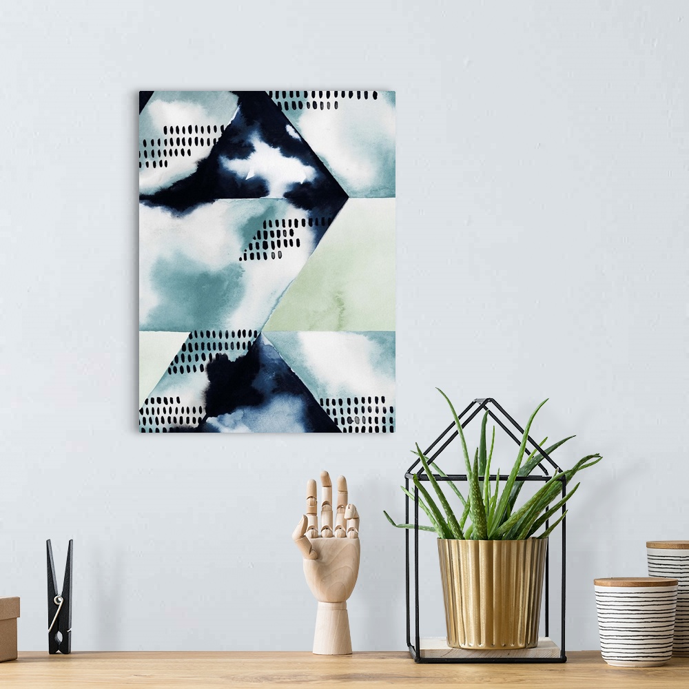 A bohemian room featuring Contemporary geometric abstract using watercolor washes in pale blue and green.