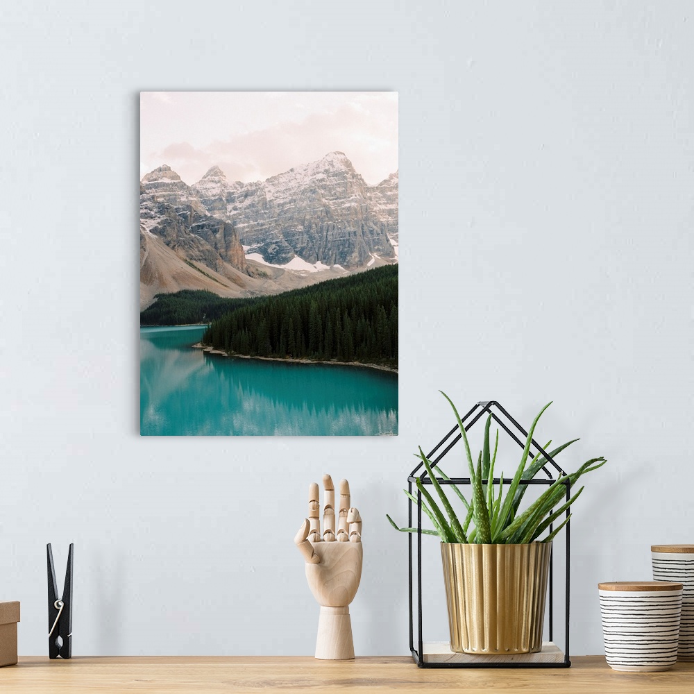 A bohemian room featuring Photograph of the trees and moutains surrounding Moraine Lake, Banff national park, Canada.