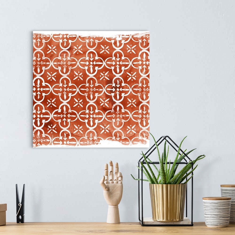 A bohemian room featuring Geometric orange and white classic fabric pattern.