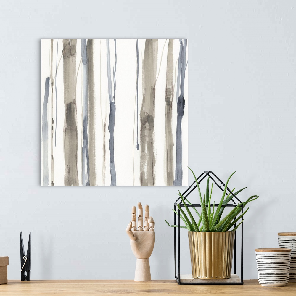 A bohemian room featuring Square watercolor painting of abstract tree trunks in brown and gray against a white background.