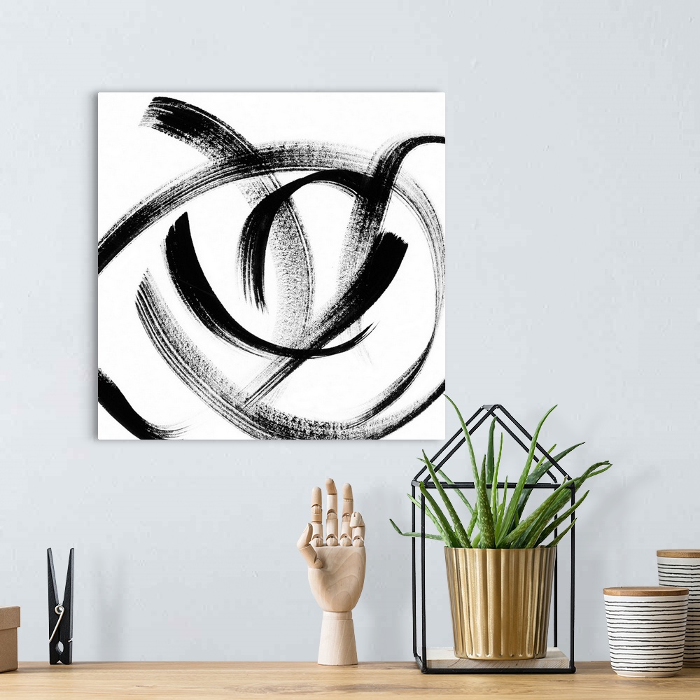 A bohemian room featuring Square abstract of bold curved brush strokes in black on a white background.