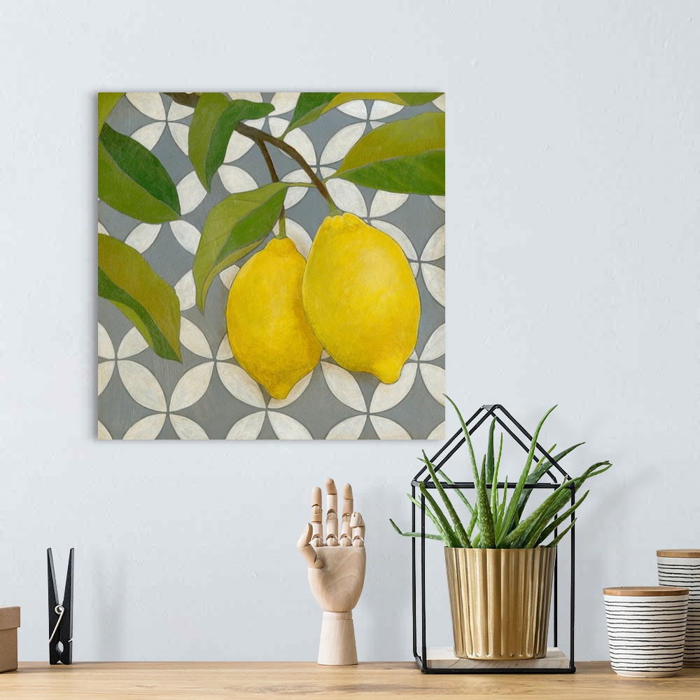 A bohemian room featuring Square painting of two lemons attached to a plant with a patterned background.
