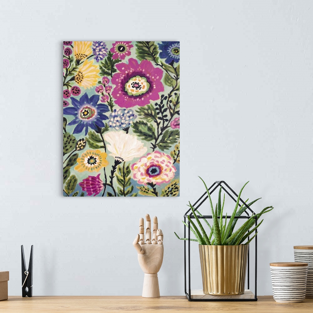 A bohemian room featuring Colorful contemporary artwork of folk style blooming flowers in a variety of sizes and colors.