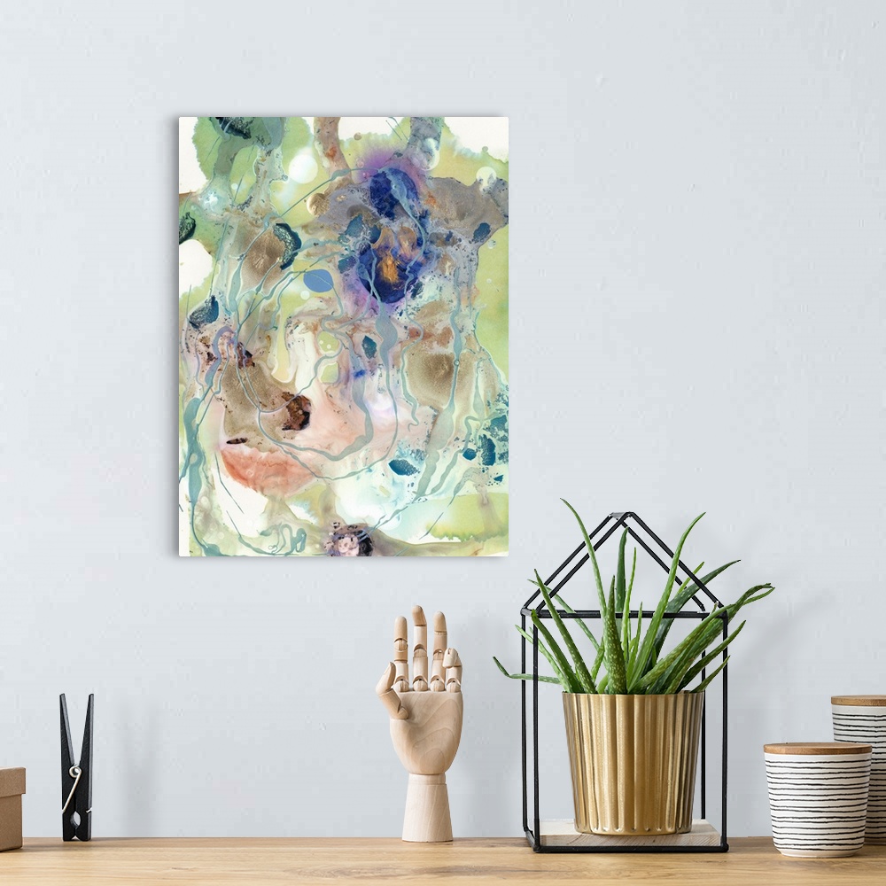 A bohemian room featuring Vertical abstract artwork of varies colors in a messy swirls with fine drips of paint.