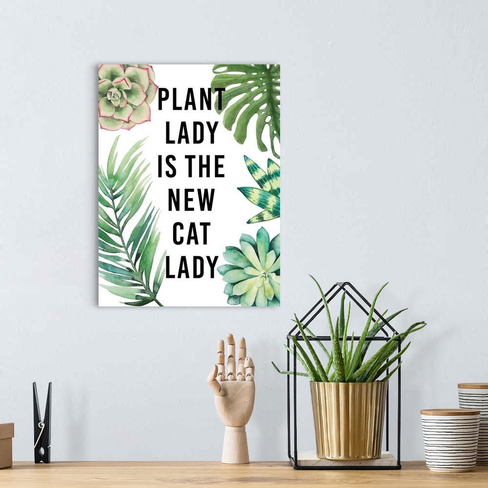 A bohemian room featuring Humorous typography artwork decorated with watercolor succulents and ferns.