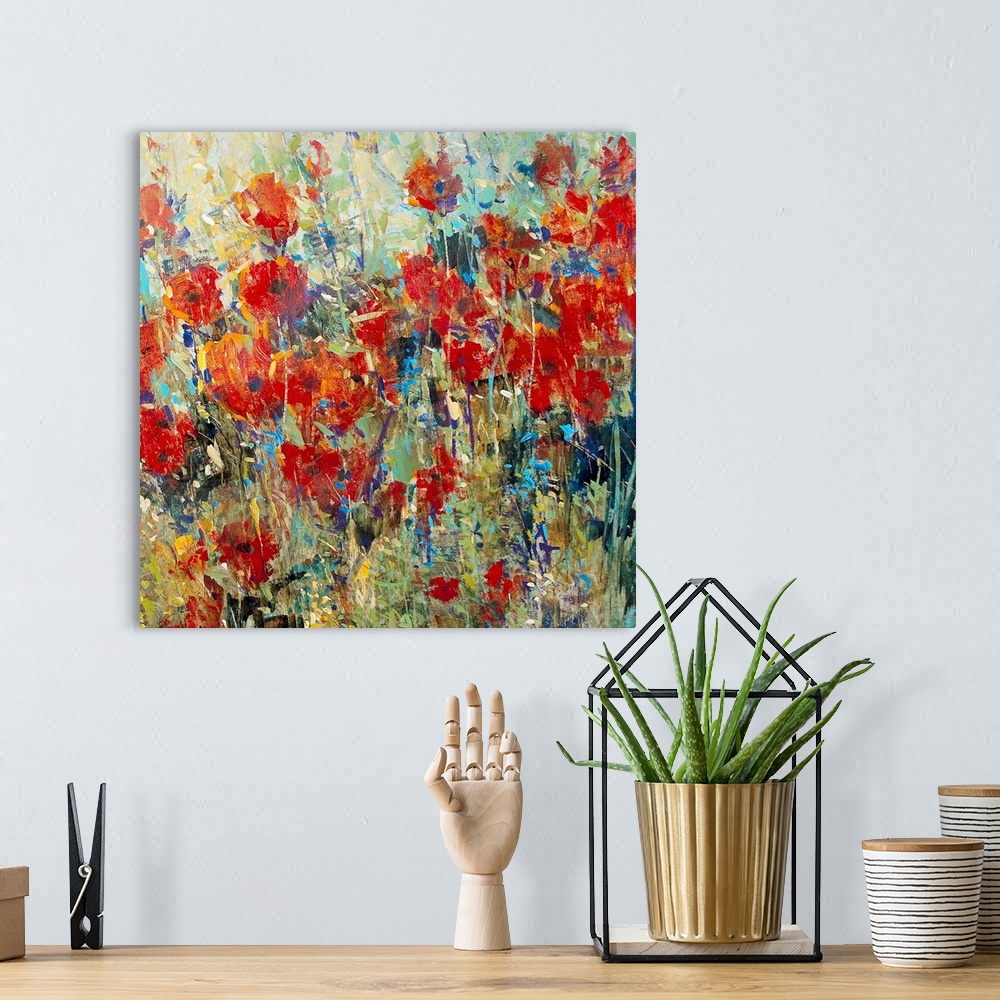 A bohemian room featuring Artwork of a field of red poppies. Rough texture is visible.