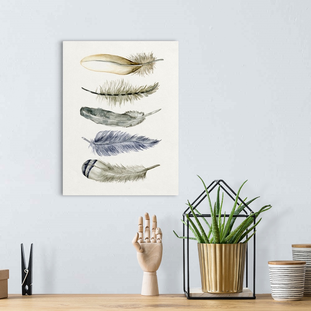 A bohemian room featuring Watercolor art print of five patterned feathers on beige.