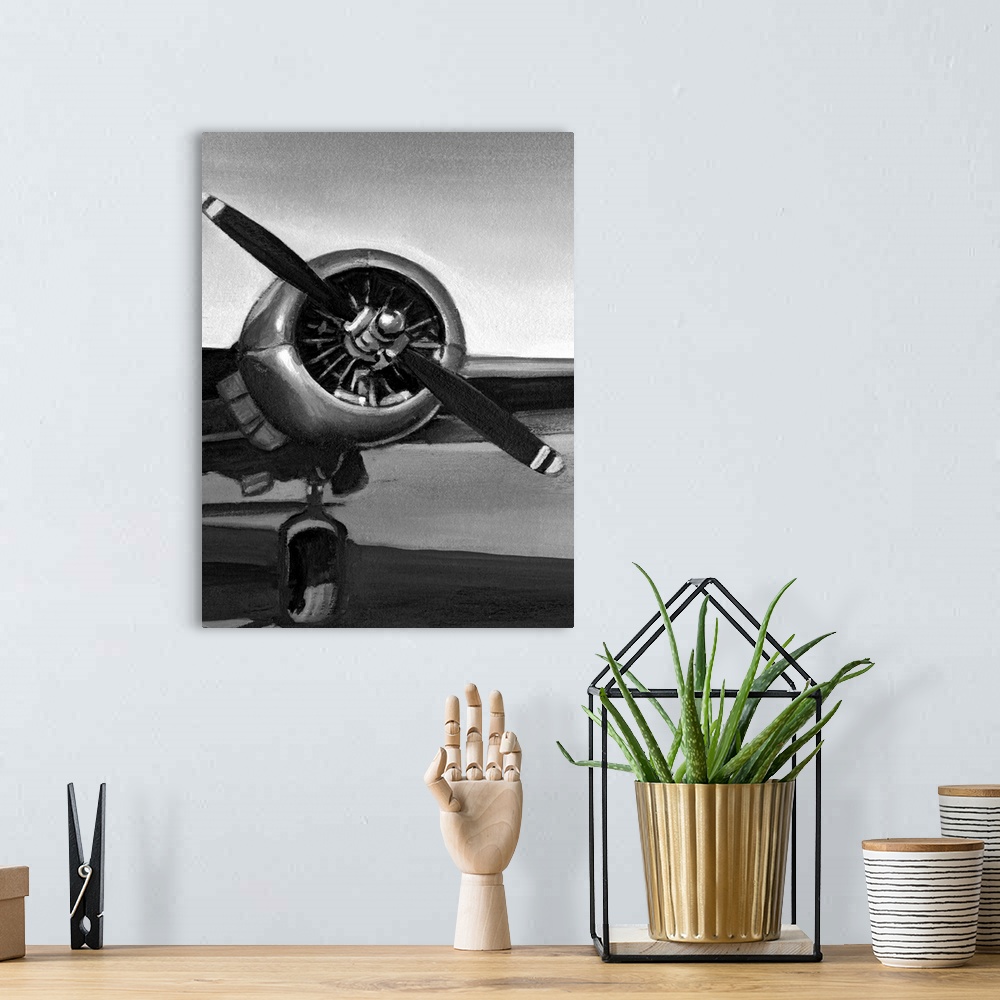 A bohemian room featuring Antique art of an airplane propeller.