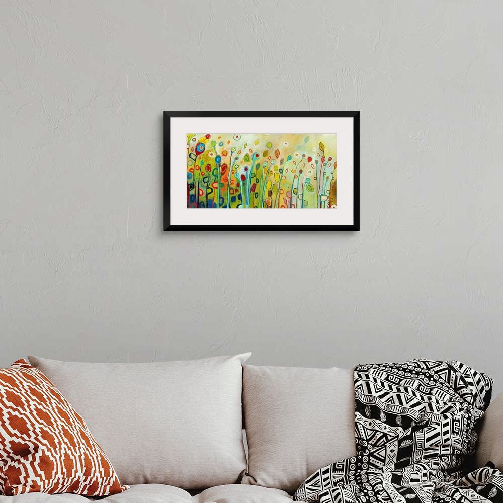 A bohemian room featuring Large contemporary painting with vertical, multicolor flowers and leaves.