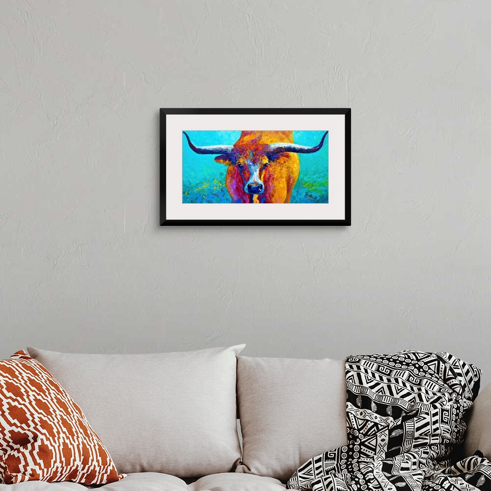 A bohemian room featuring Contemporary panoramic painting of a bull with its horns extending to both ends of the image.