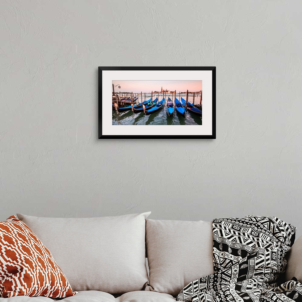 A bohemian room featuring Panoramic photograph of blue gondolas docked in a row on the water with St. Mark's Square in the ...