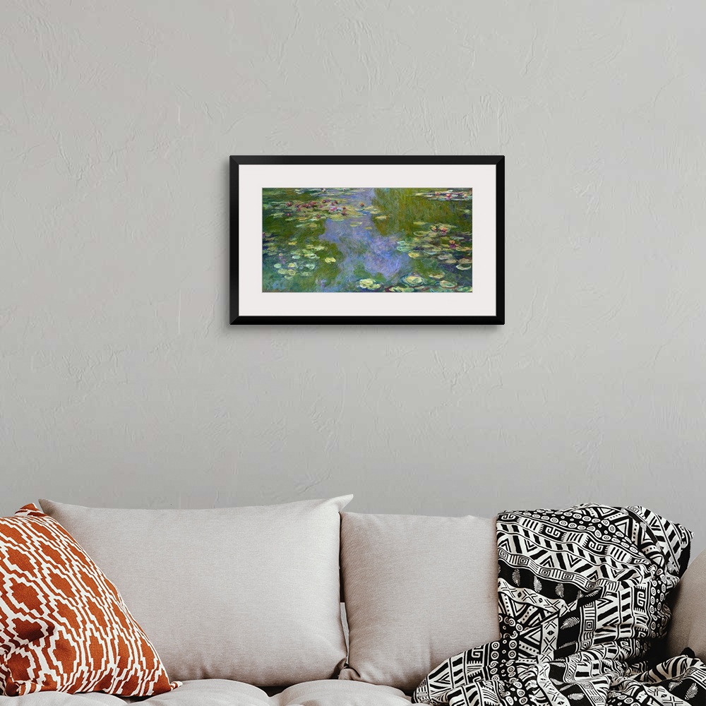 A bohemian room featuring This work is one of four pictures of water lilies that, quite exceptionally, Monet finished, sign...