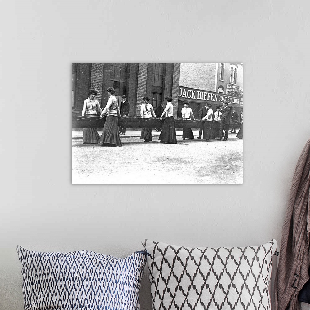 A bohemian room featuring circa 1907:  The Furnivall Rowing Eight bringing in their boat